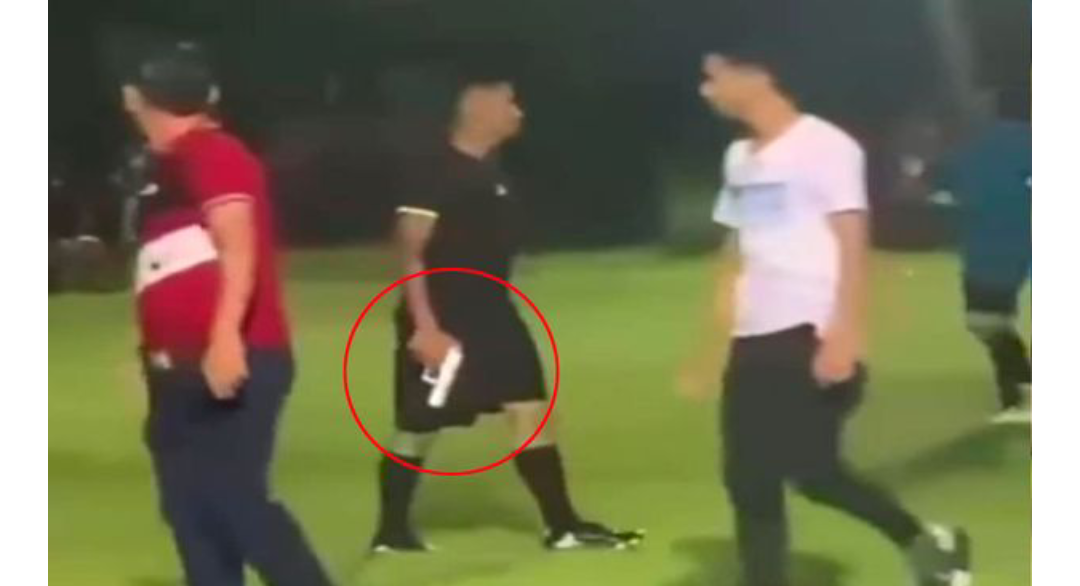 Shocking Moment A Referee Pulls A Gun Out On Angry Fans To Restore Order After Controversial Penalty Call