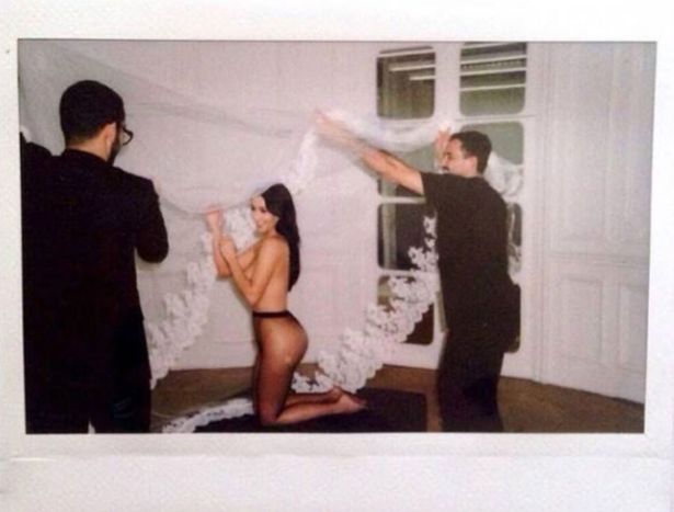 Kim Kardashian shares pics from wedding to Kanye West – but he’s not in any of them
