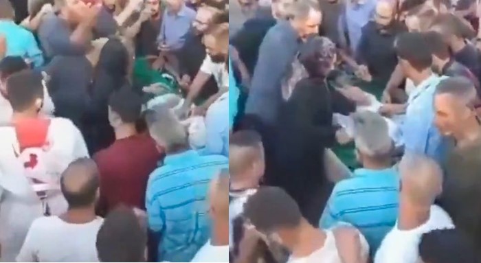 ourners stunned as corpse comes back to life moments before burial (Video)