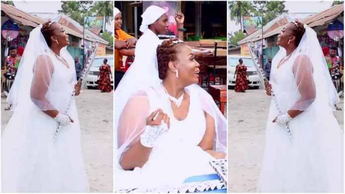 I have money, lady says as she hits the streets in wedding gown to look for a husband (Watch)